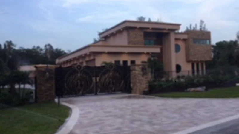 Gated Florida estate with impact windows throughout