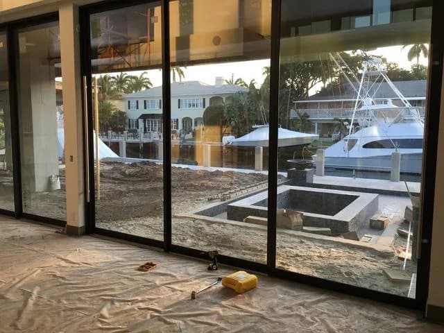 Impact sliding doors onto a waterfront dock